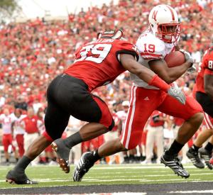 Nebraska's Quentin Castille (19) scores a touchdown against Texas Tech's Marlon Williams during their college football game Saturday, Oct. 11, 2008 at Jones AT&T Stadium in Lubbock, Texas. (AP)